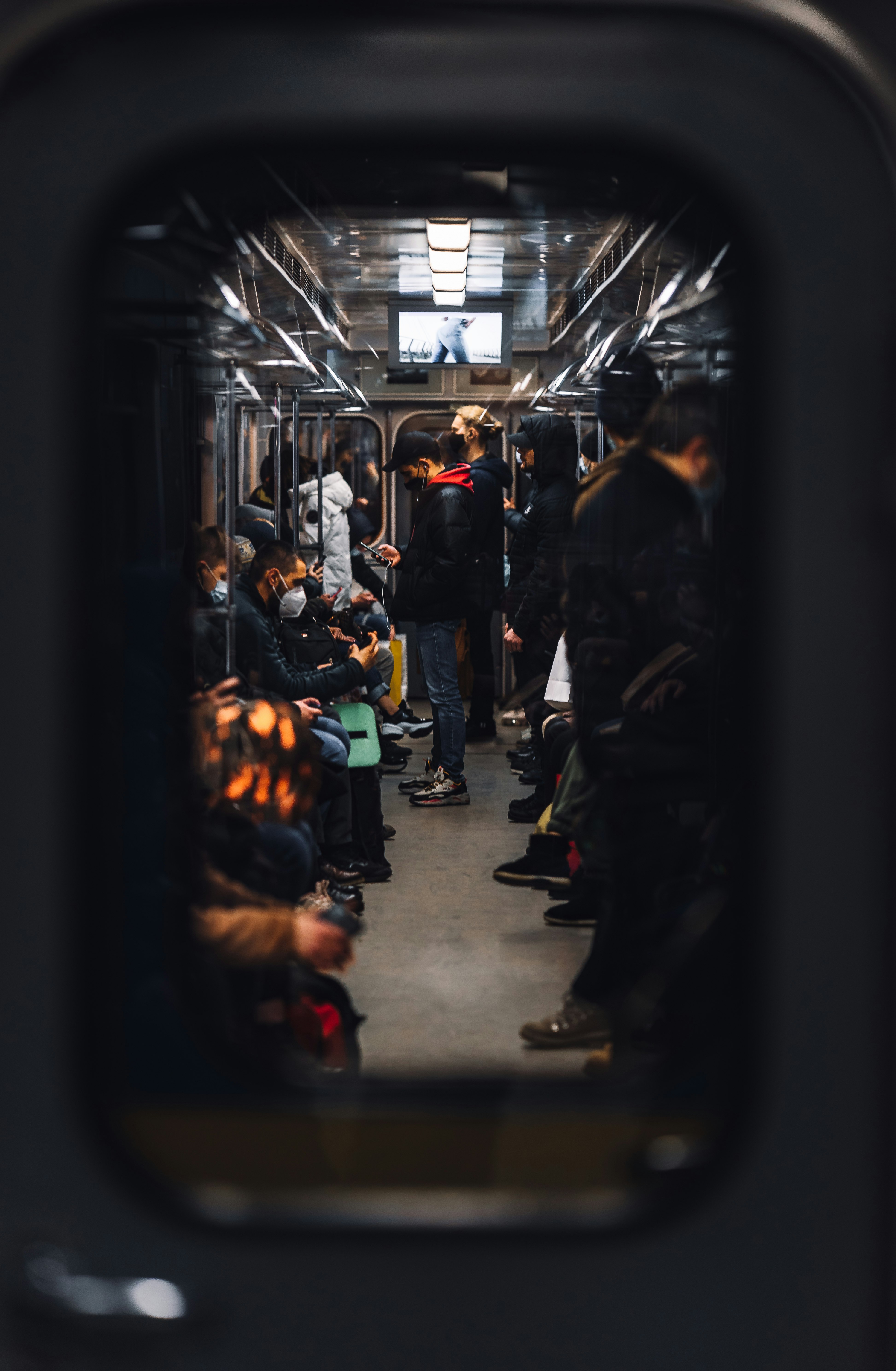 people in train station during nighttime